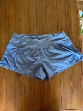 Nike Women's Light Blue Athletic Running Shorts with Gray Waistband